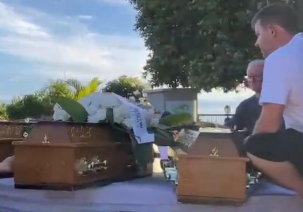 Dor e despedida: LEM se comove com sepultamento de trs membros da mesma famlia vtimas de acidente na BR 242